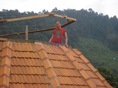 Alex on top of the nearly-finished terracotta roof, October 2010